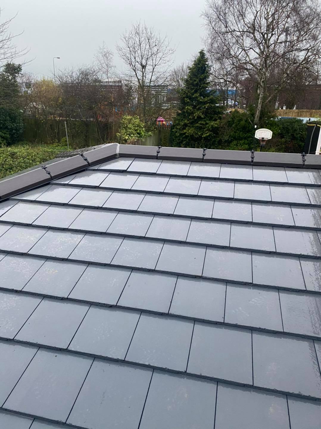 Finished slate-style pitched roof
