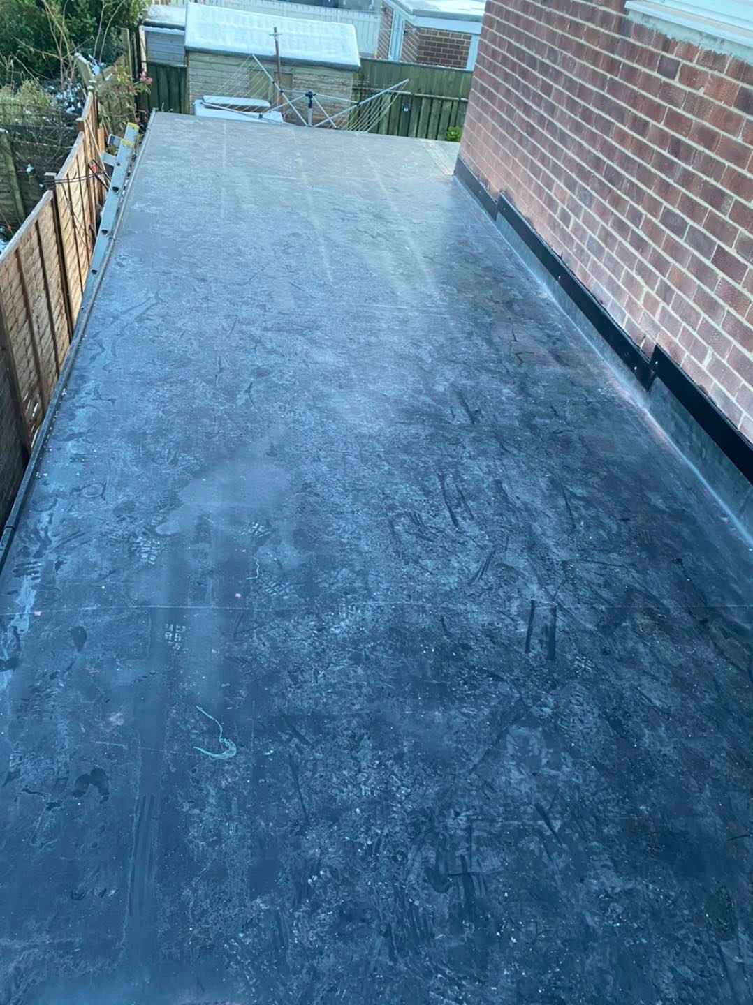 Finished flat roof membrane with neat edge detailing