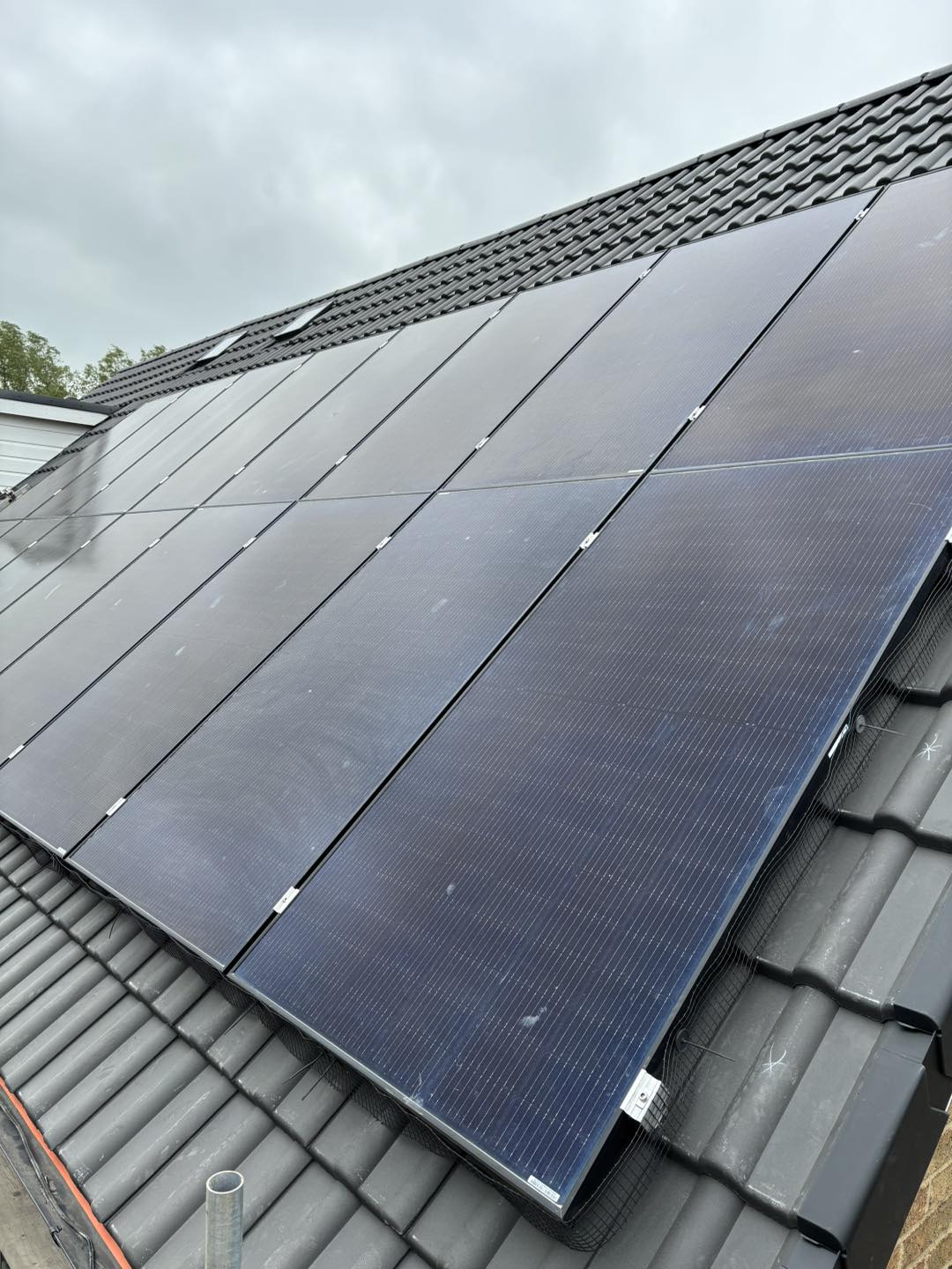 Solar panels fitted on a tiled roof